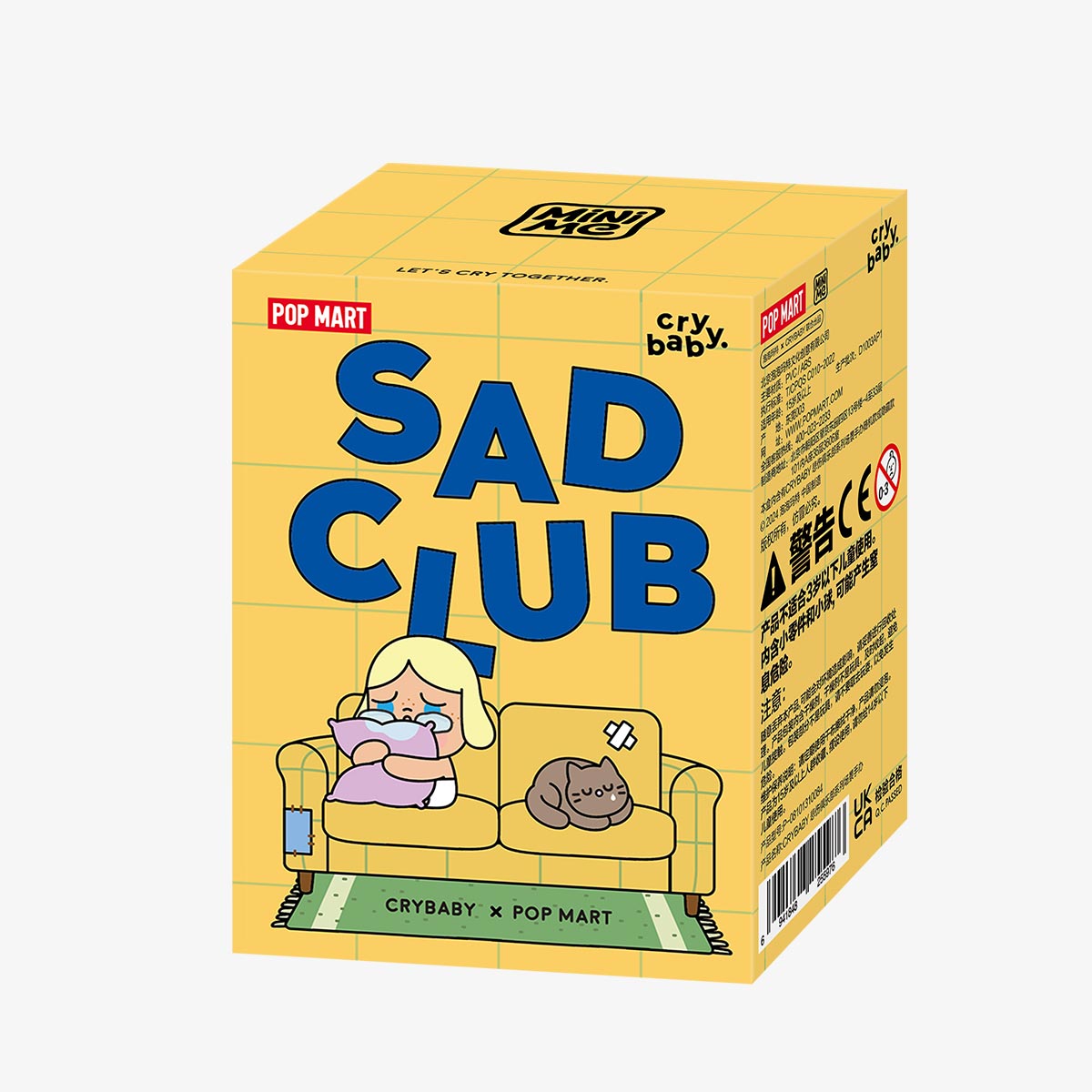CRYBABY Sad Club Series blind box packaging with yellow design and series information. Official collectible mystery box featuring emotional diorama scene sets.