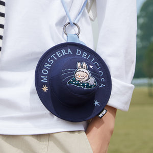 Navy blue spherical character blind box collectible with smooth glossy finish. Exclusive POP MART designer toy series.