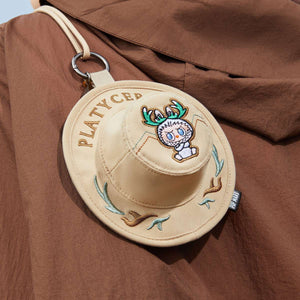 Cream/beige round plush character blind box collectible with soft textured fabric and minimalist design. POP MART limited edition figure.