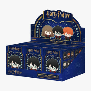 Harry Potter Magic Academy retail display box containing multiple blind boxes with navy blue and gold design. Complete assortment of collectible wizard-themed figures from the magical series.