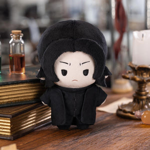 Harry Potter Magic Academy Cotton Doll of dark-robed character with white face. Collectible plush featuring recognizable villain from the wizarding series.
