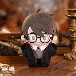 Harry Potter Magic Academy Cotton Doll of male character in brown and black Hogwarts uniform. Detailed collectible plush with wizard school outfit.