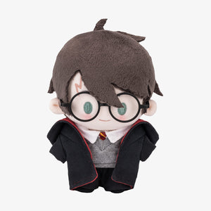 Harry Potter Magic Academy Cotton Doll featuring character with dark hair, glasses, and Hogwarts uniform. Collectible soft plush with detailed wizard design.