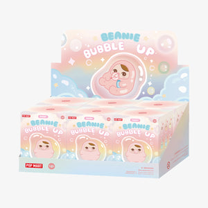PUCKY BEANIE BUBBLE UP SERIES display box containing multiple blind boxes with colorful packaging. Complete retail assortment of collectible plush pendants.