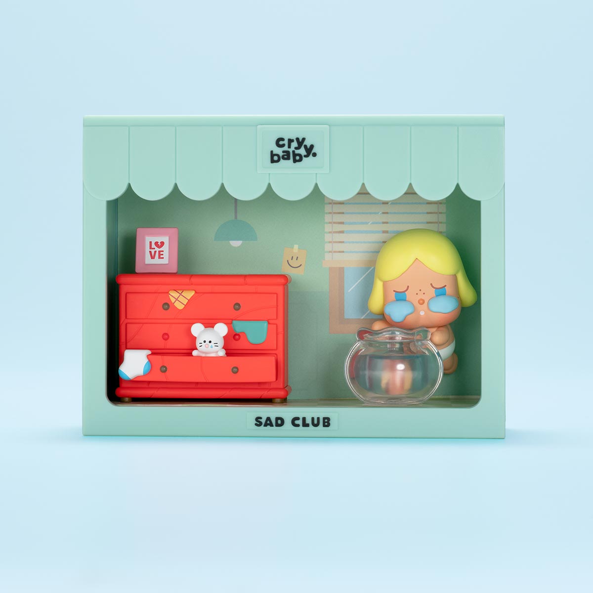 CRYBABY Sad Club Series blue-themed bathroom scene set with detailed miniature fixtures and emotional character. Collectible diorama displaying vulnerable storytelling elements.