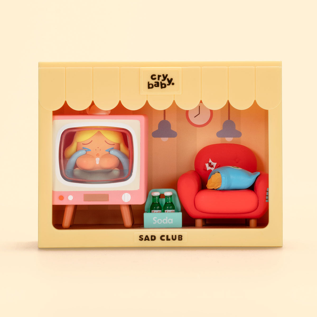CRYBABY Sad Club Series yellow-themed kitchen diorama with detailed miniature appliances and emotional character interaction. Collectible scene set with domestic storytelling focus.