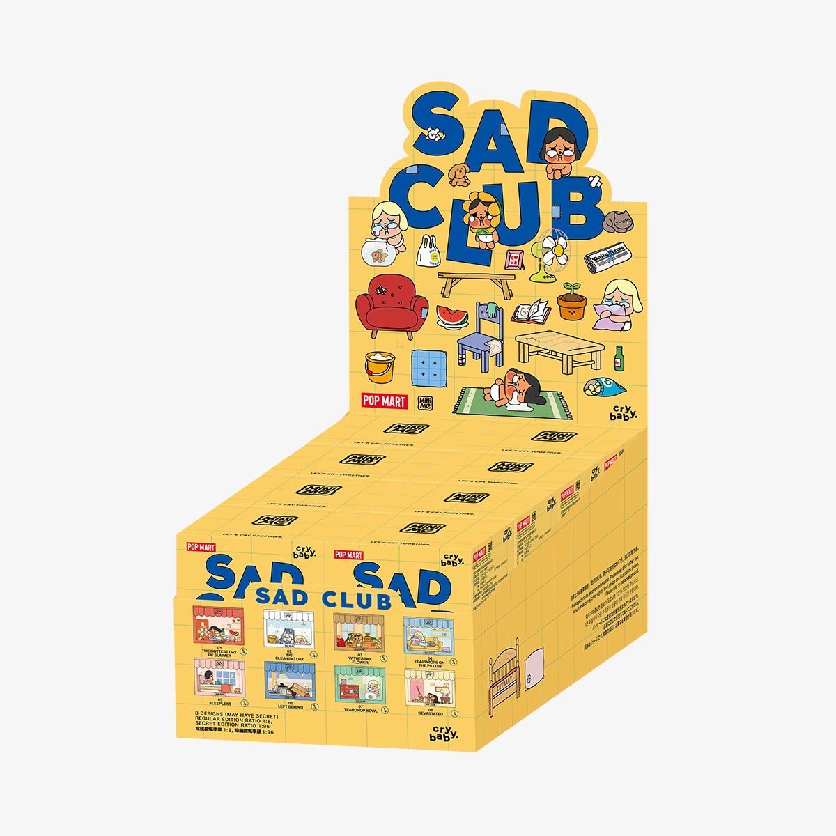 CRYBABY Sad Club Series retail display box containing multiple blind boxes with yellow and illustrated design. Complete assortment of collectible emotional scene sets with artwork showcasing the full diorama collection.